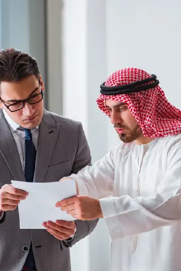 Arab man analyzing LUDIATE company report