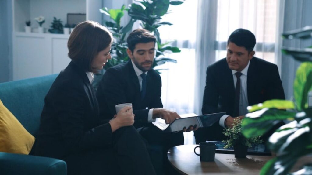 Business professionals meeting consultation office discussion tablet